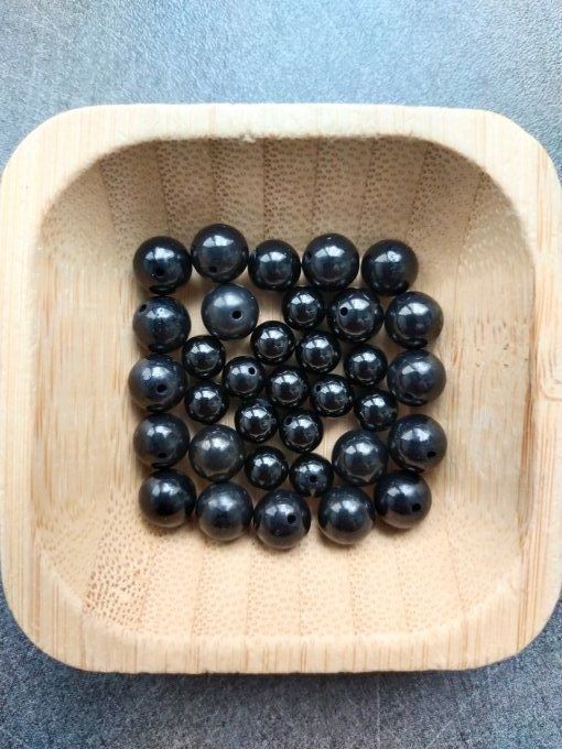 Perle Spinelle noir à l'unité
