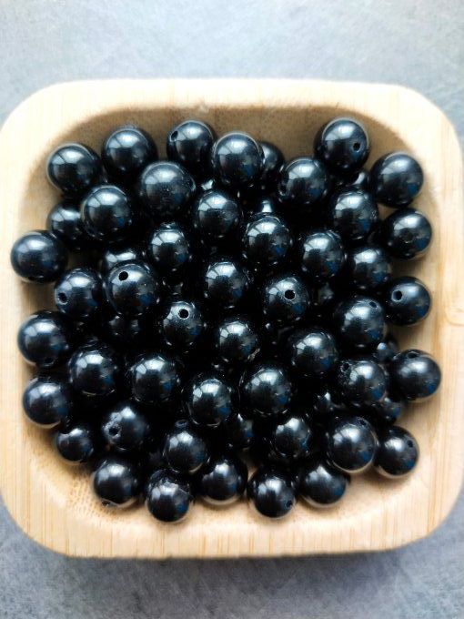 Perle Spinelle noir à l'unité